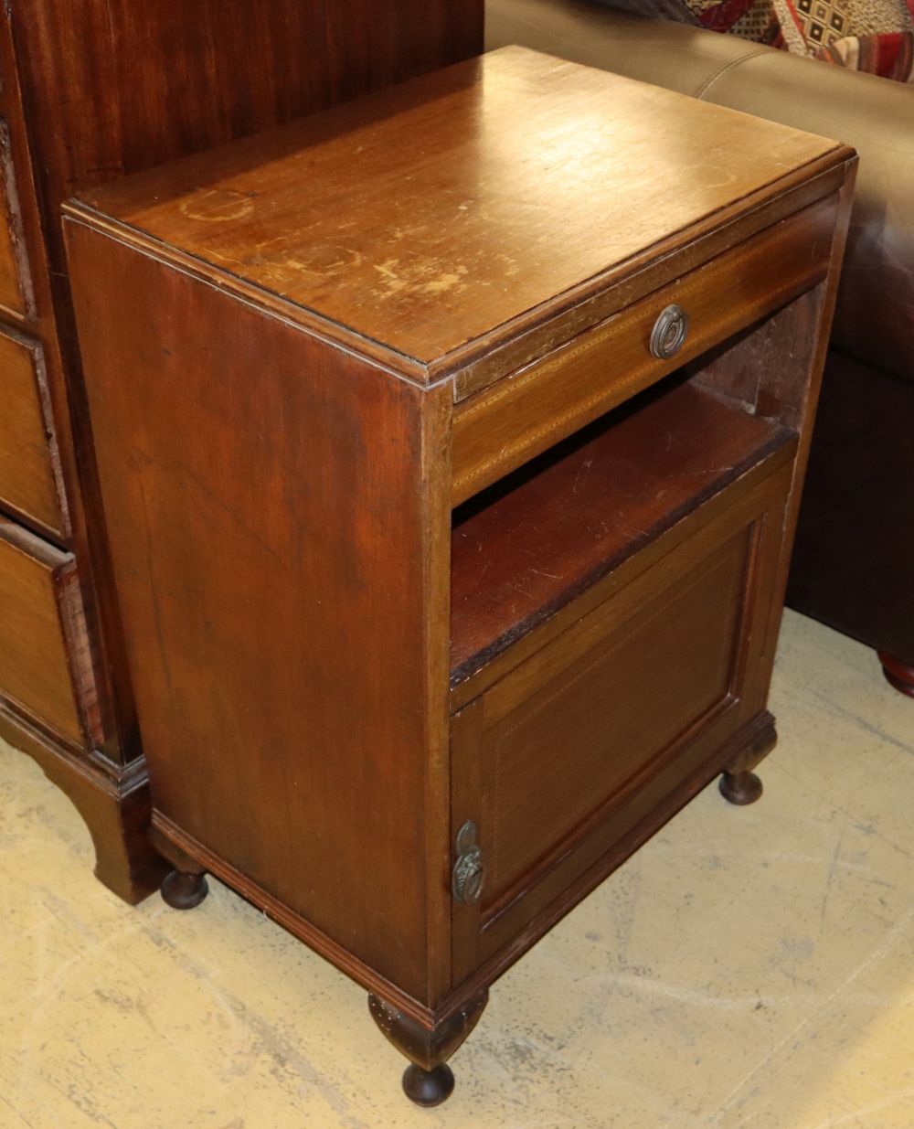 A pair of 1920s chequer inlaid walnut bedside cupboard, W.53cm